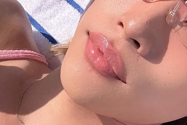 Close-up of glossy lips showing hydrating lipgloss